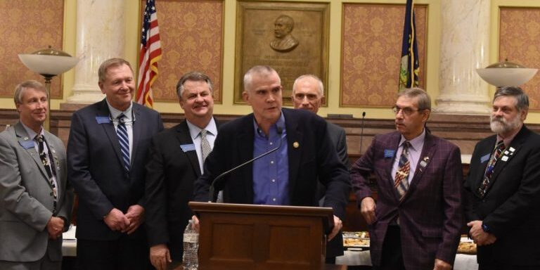 Montana Freedom Caucus members stand behind Congressman Matt Rosendale as he delivers remarks during MTFC "Celebrate Courage" kickoff event. (Photo: Darin Gaub)