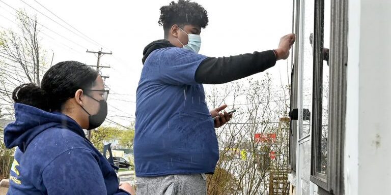 Health representatives for Massachusetts Department of Health COVID-19 Equity go door-to-door in Farmingham.