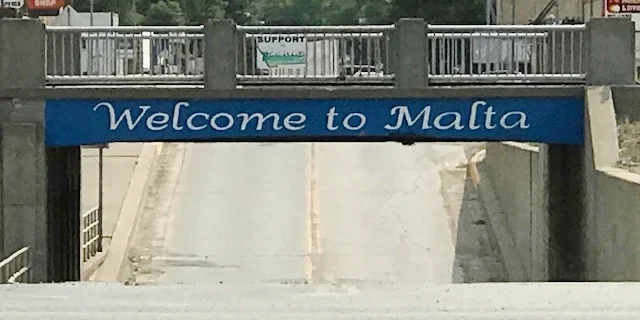 Welcome to Malta: Town Entrance Banner