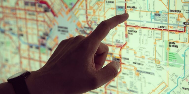 person holding white printer paper