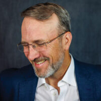 Candid Portrait of a Smiling Businessman Candid Portrait of a Smiling Businessman