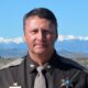 Sheriff Portrait with Mountain Backdrop